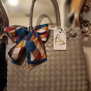 Elegant Gray Woven Tote Bag with Colorful Scarf